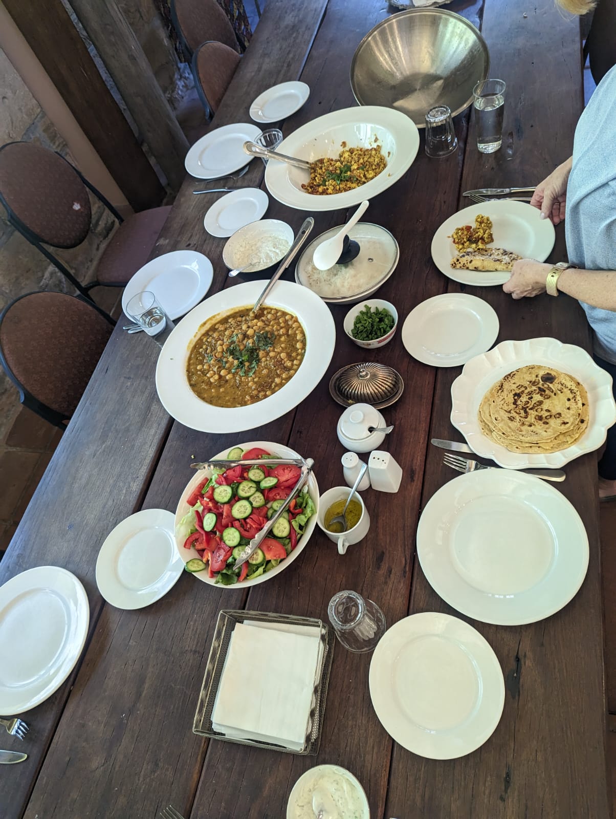 The serene infinity pool at Yanada Retreat in NSW, reflecting the surrounding lush forest; a tranquil outdoor wellness space for relaxation and meditation during the Mystique Moksha Samatvam yoga retreat